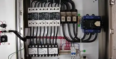 Electrical panel installation with organized circuit breakers and wiring in Orange, CA