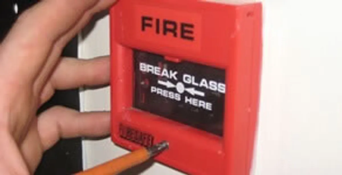 fire alarm installation service showing manual fire alarm pull station installed by licensed electricians in Orange, CA