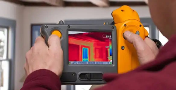 home energy audit service capturing thermal readings to analyze insulation and electrical efficiency in Orange, CA
