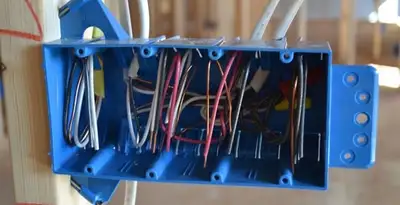 new construction wiring installation featuring electrical boxes and cable routing by expert electricians in Orange, CA