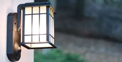 security light installation services with professionally mounted exterior wall light in Orange, CA