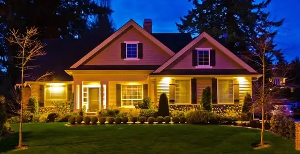 security light installation services illuminating a residential exterior at night in Orange, CA