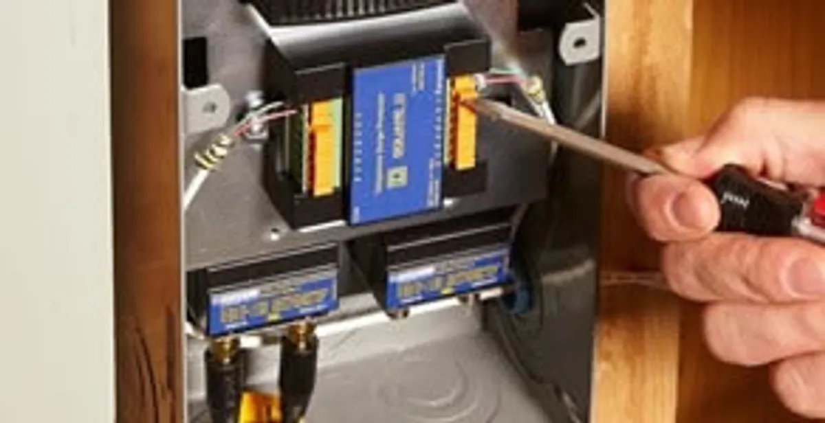 Whole home surge protection device being installed by a licensed electrician to protect electrical systems in Orange, CA