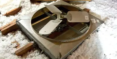 whole house fan installation services with attic-mounted ventilation unit in Orange, CA